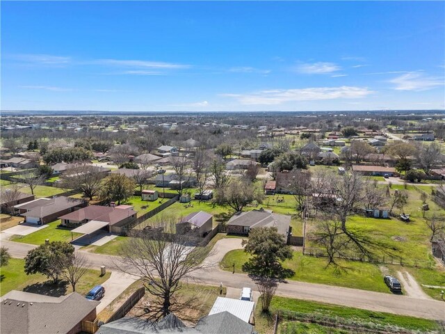 birds eye view of property with a residential view