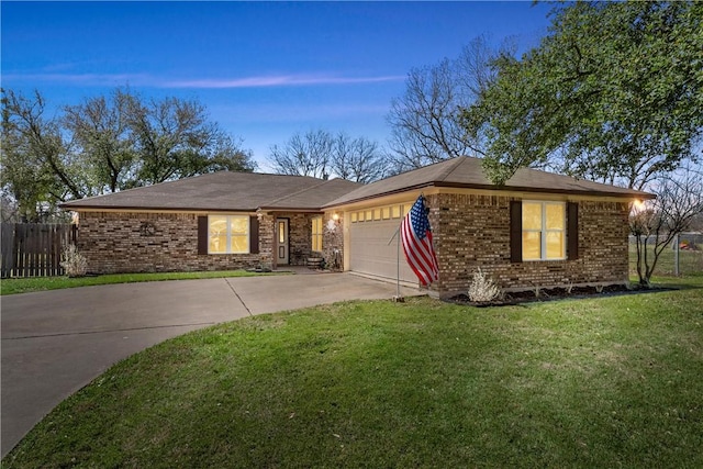 ranch-style house featuring a garage, concrete driveway, a front lawn, and fence