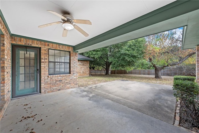 view of patio featuring ceiling fan