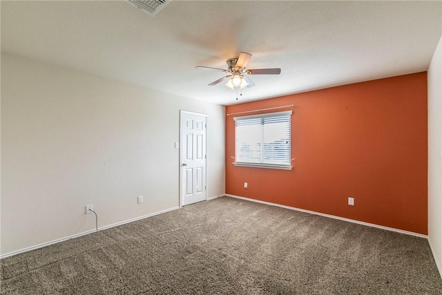 carpeted empty room with ceiling fan