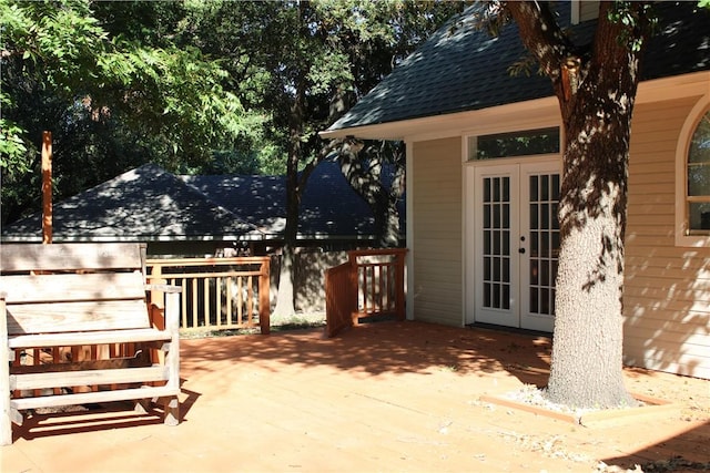 view of patio with french doors and a deck