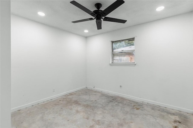 spare room with ceiling fan