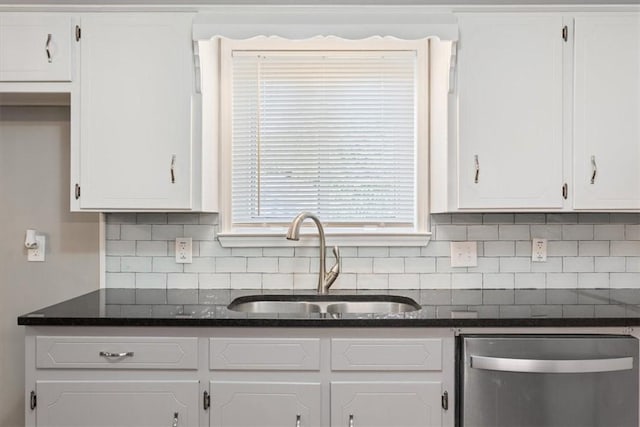 kitchen with dishwasher, white cabinetry, and sink