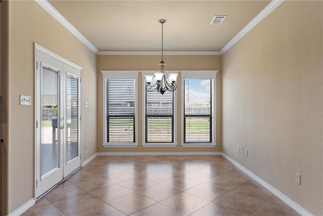 unfurnished dining area featuring an inviting chandelier, light tile patterned floors, crown molding, and french doors