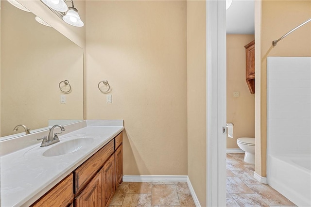 full bathroom featuring vanity, toilet, and shower / bathtub combination