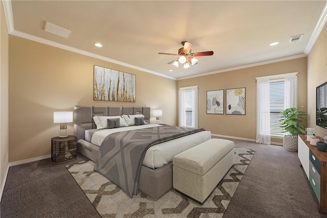 bedroom featuring carpet flooring, ceiling fan, crown molding, and multiple windows