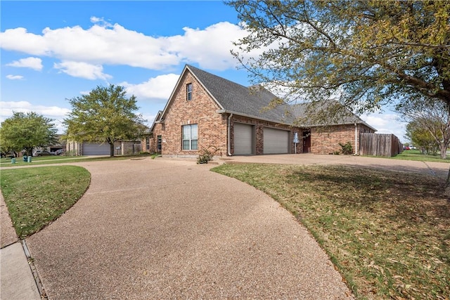 view of home's exterior featuring a yard and a garage