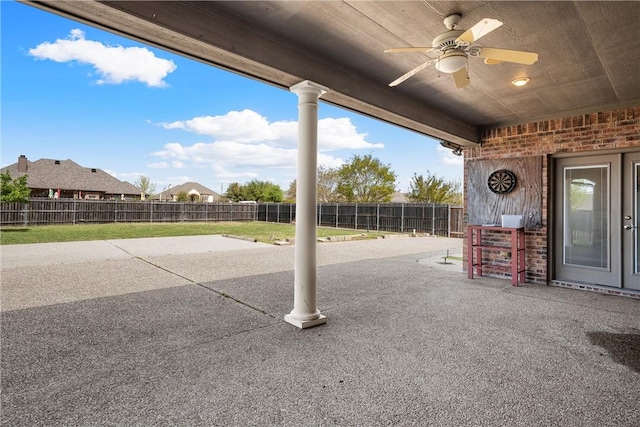 view of patio featuring ceiling fan