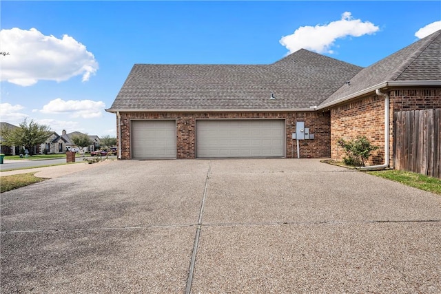 view of property exterior with a garage