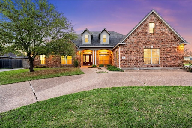 view of front of house with a lawn