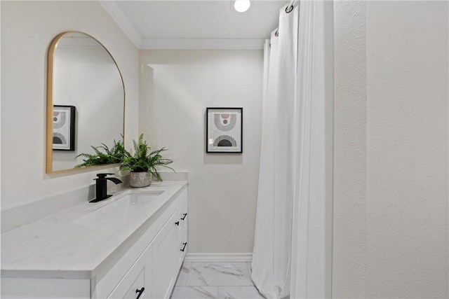 bathroom with vanity and crown molding