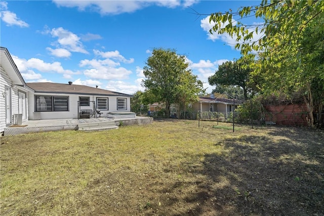 view of yard featuring a deck