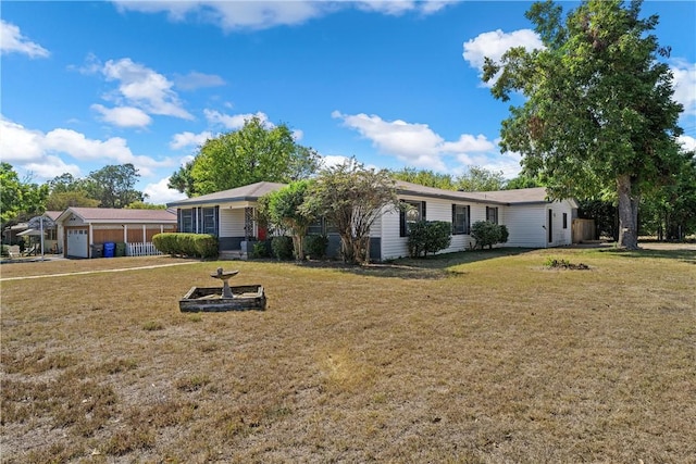 ranch-style house featuring a front lawn