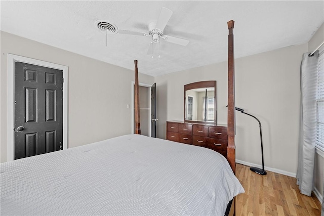 bedroom featuring ceiling fan and light wood-type flooring