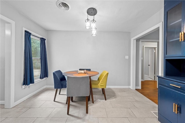 dining room with light tile patterned floors