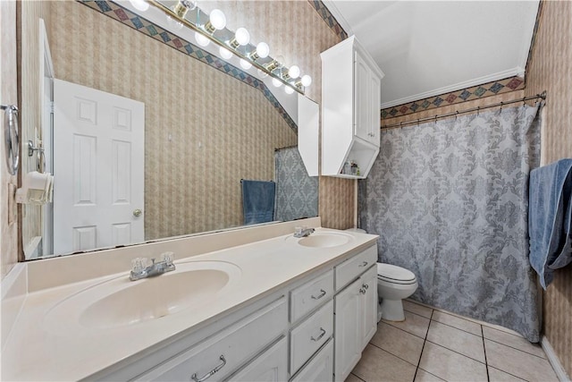 bathroom with ornamental molding, tile patterned flooring, vanity, and toilet