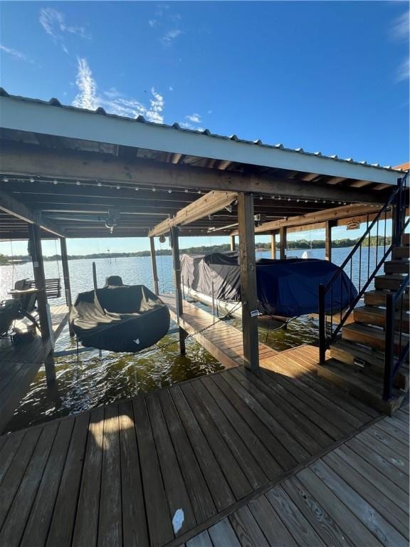 dock area featuring a water view