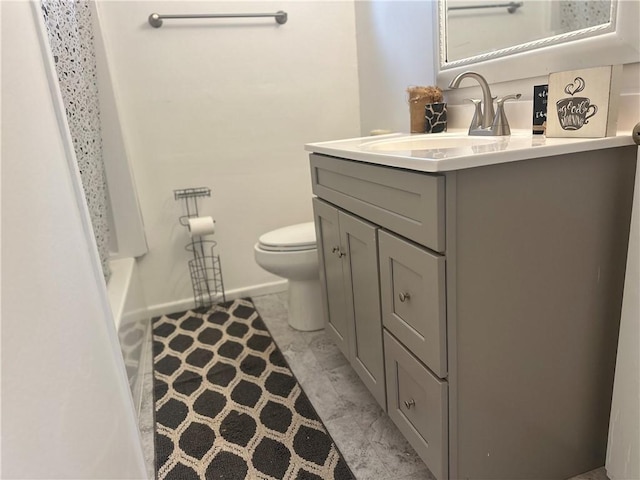 bathroom with vanity and toilet