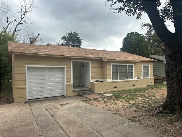 ranch-style home with a garage