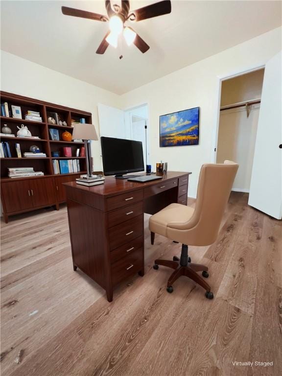 home office featuring light hardwood / wood-style flooring