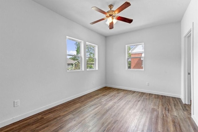 unfurnished bedroom featuring ceiling fan and hardwood / wood-style floors