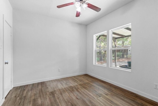 unfurnished room featuring hardwood / wood-style flooring and ceiling fan