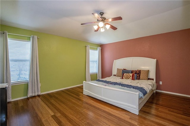 bedroom featuring hardwood / wood-style floors and ceiling fan