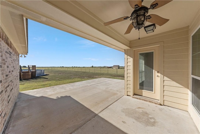 view of patio with ceiling fan