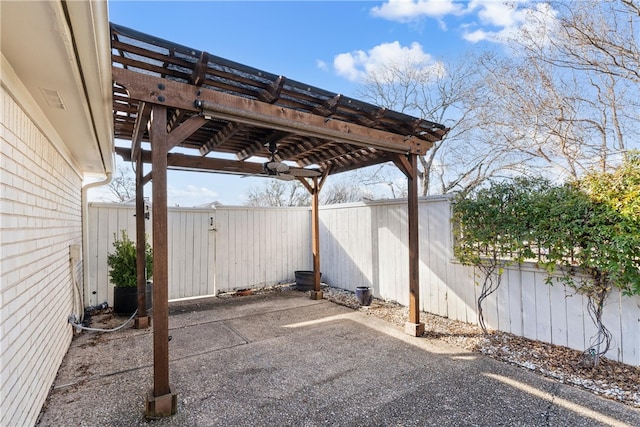 view of parking featuring a fenced backyard