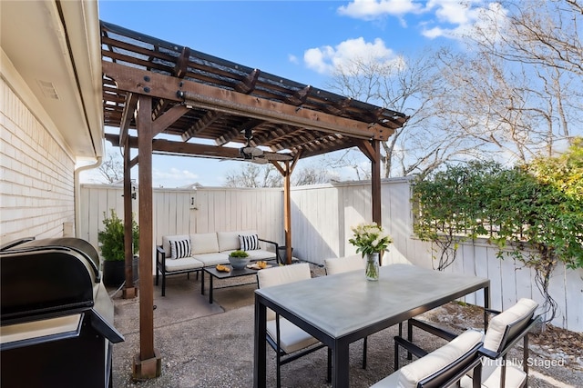 view of patio / terrace with outdoor dining area, a fenced backyard, an outdoor hangout area, and a pergola