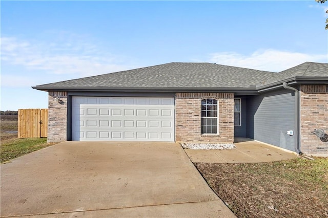 single story home featuring a garage