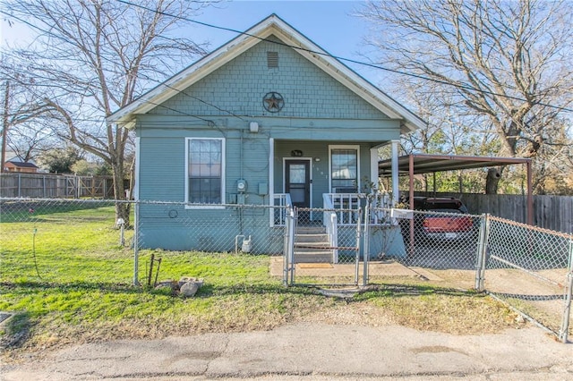 view of front of home featuring a carport, a porch, and a front yard