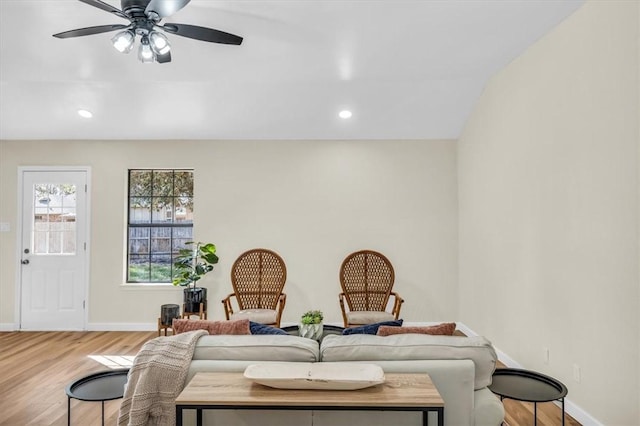 living area featuring ceiling fan, recessed lighting, wood finished floors, and baseboards