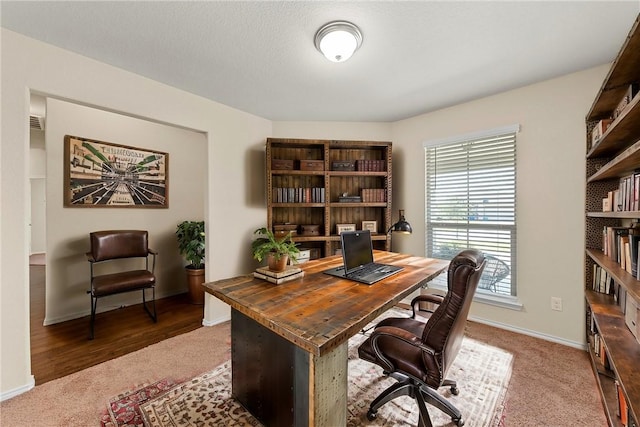 view of carpeted office space