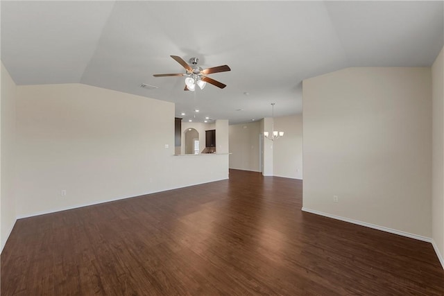 unfurnished living room with lofted ceiling, ceiling fan with notable chandelier, and dark wood-type flooring