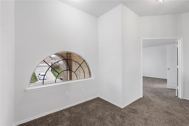 unfurnished room with carpet floors