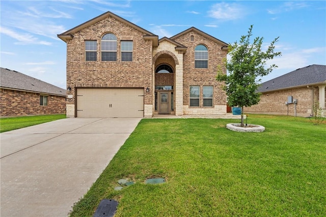 view of property with a front yard and a garage