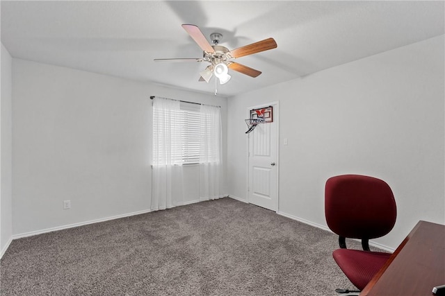 unfurnished office with carpet flooring and ceiling fan