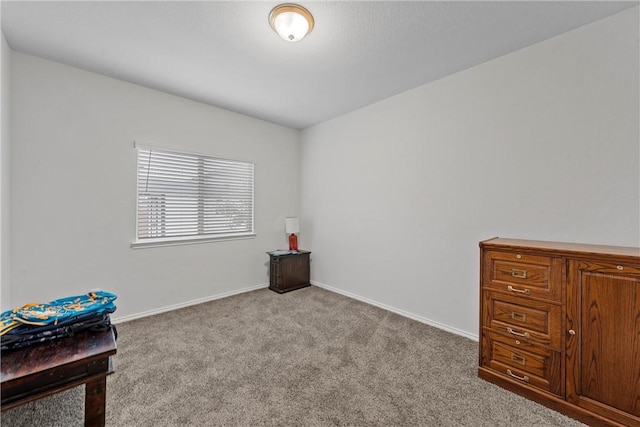 interior space featuring light colored carpet