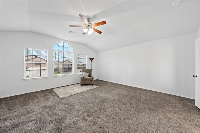 unfurnished room with carpet, ceiling fan, and lofted ceiling