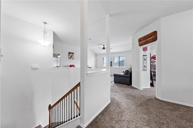 hallway with carpet flooring