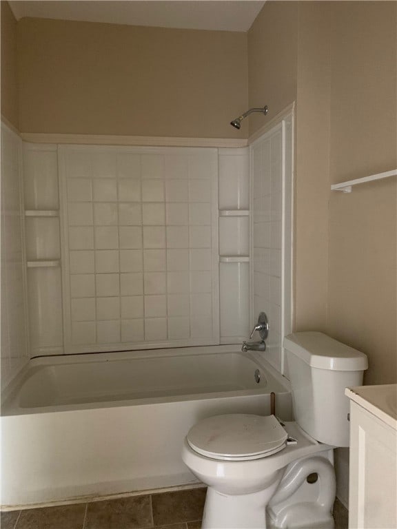 full bathroom featuring tile patterned flooring, vanity, toilet, and shower / tub combination