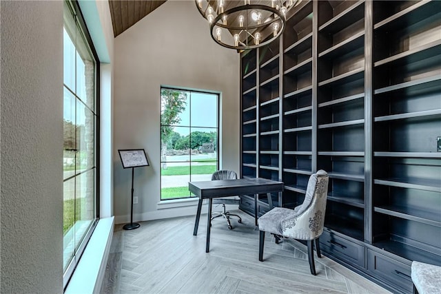 home office with parquet floors, wood ceiling, a chandelier, and a high ceiling