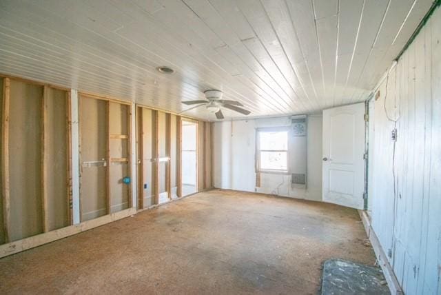 unfurnished room featuring ceiling fan and wood ceiling