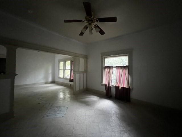 empty room featuring ceiling fan