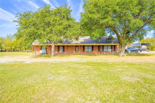 single story home with a front lawn