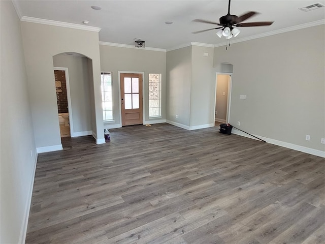 foyer featuring hardwood / wood-style flooring, ceiling fan, and crown molding