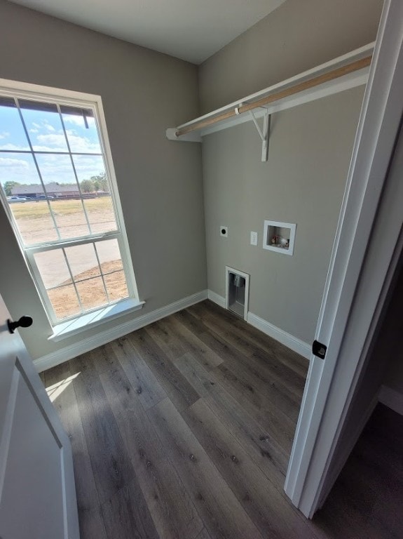 laundry area with dark hardwood / wood-style flooring, hookup for a washing machine, and electric dryer hookup