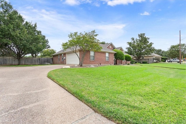 view of home's exterior with a lawn and a garage