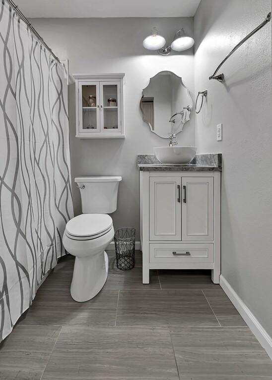 bathroom with vanity and toilet